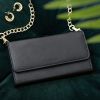 Selencia Tierra Uitneembare Slang Clutch iPhone 12 (Pro) - Zwart / Schwarz / Black